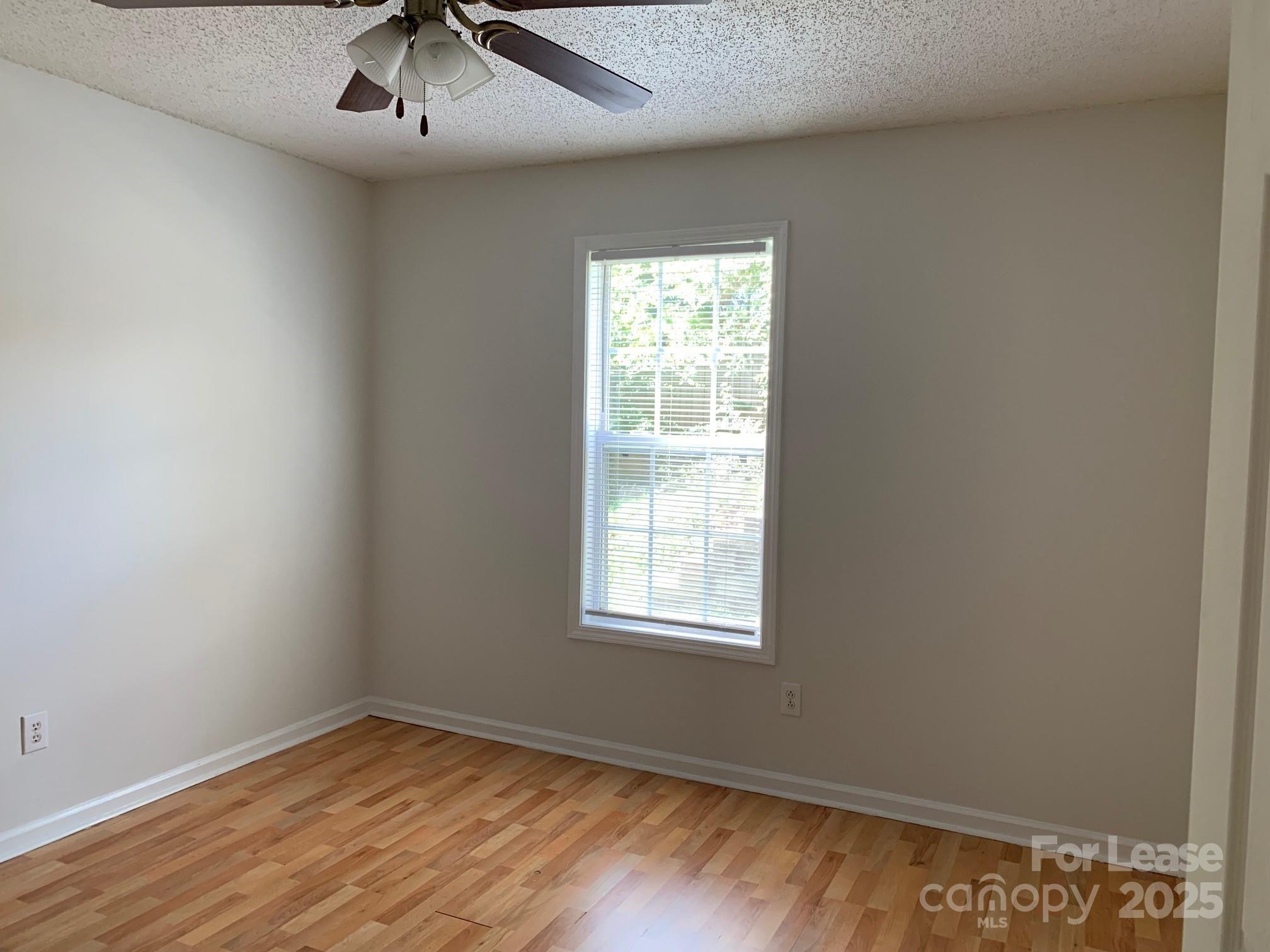 56 Tribune Avenue Southwest, Unit C Concord, NC 28025 - Photo 10 of 11 an empty room with a window