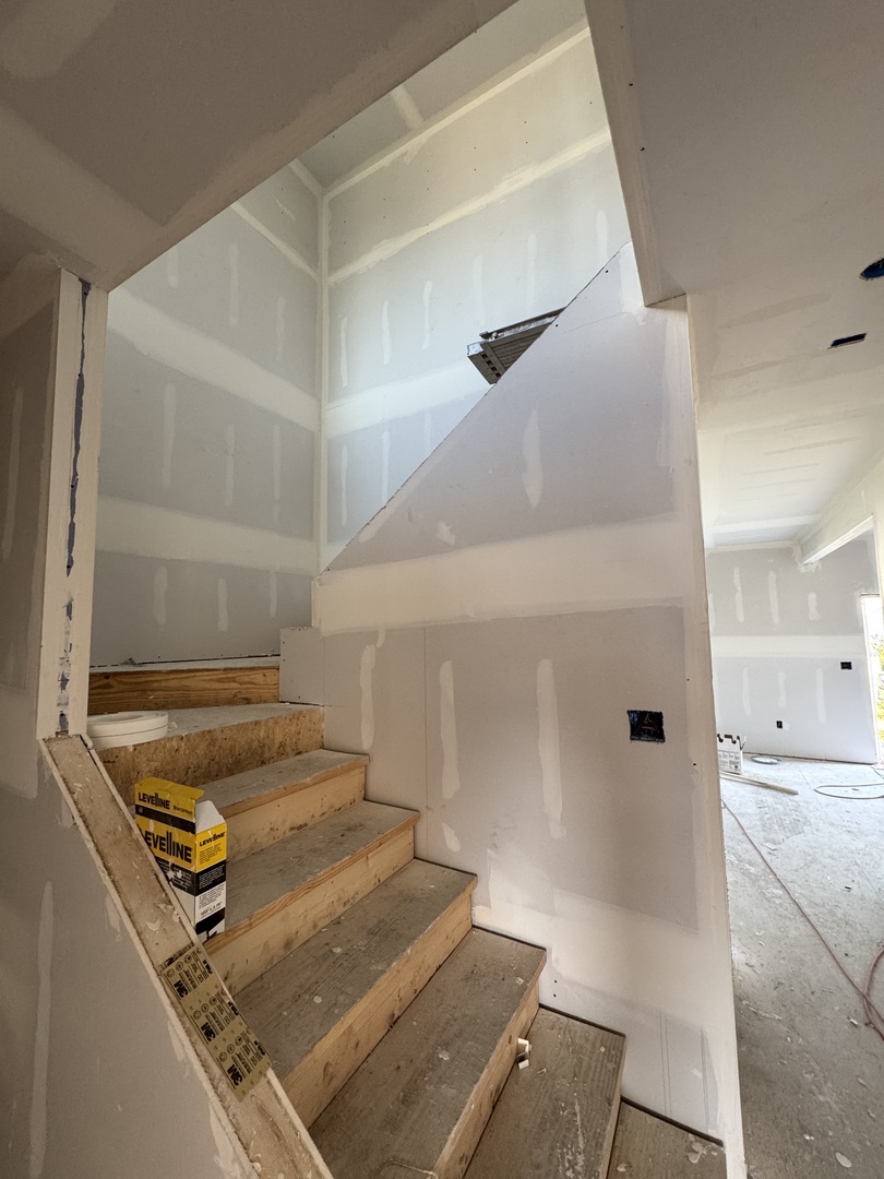 3712 Lighthouse Pointe Champaign, IL 61822 - Photo 11 of 11 a view of staircase with white walls