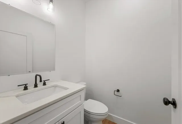 a bathroom with a sink and a toilet