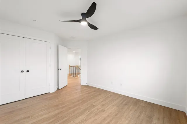 a view of a livingroom with wooden floor