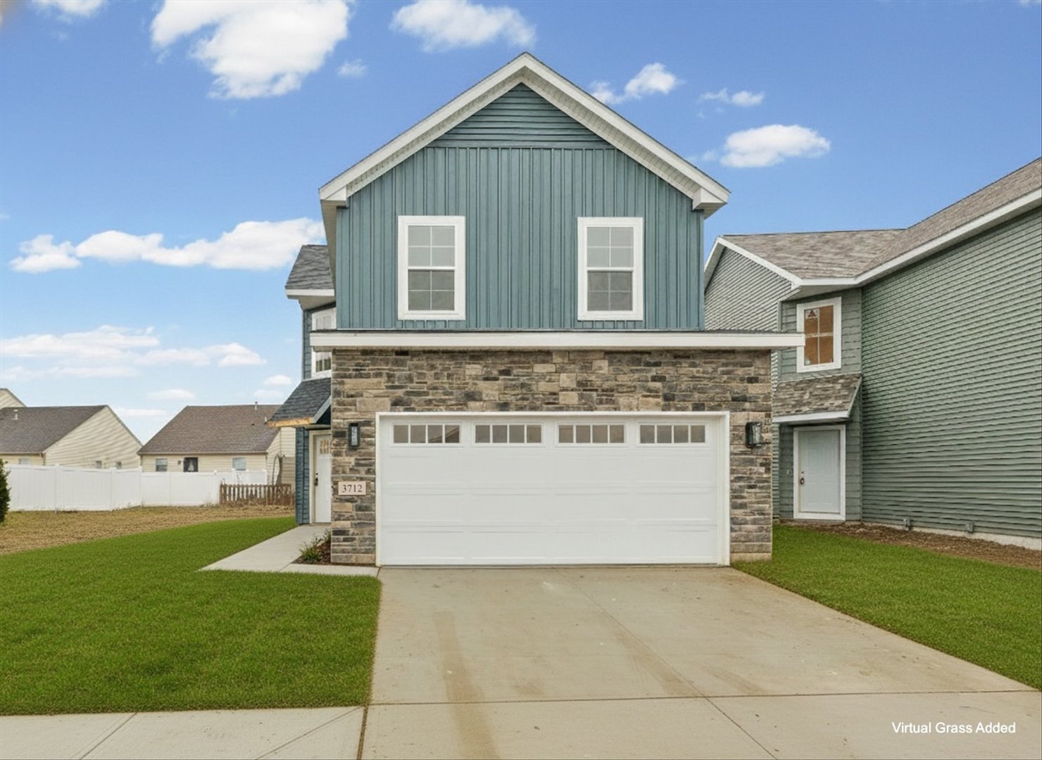 3712 Lighthouse Pointe Champaign, IL 61822 - Photo 2 of 36 a view of a house with a yard