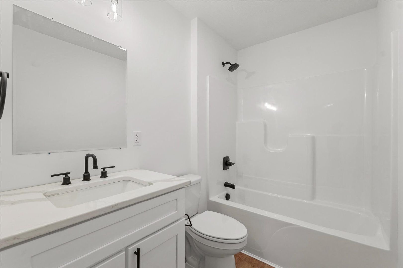 3712 Lighthouse Pointe Champaign, IL 61822 - Photo 29 of 36 a bathroom with a sink a toilet and a bathtub