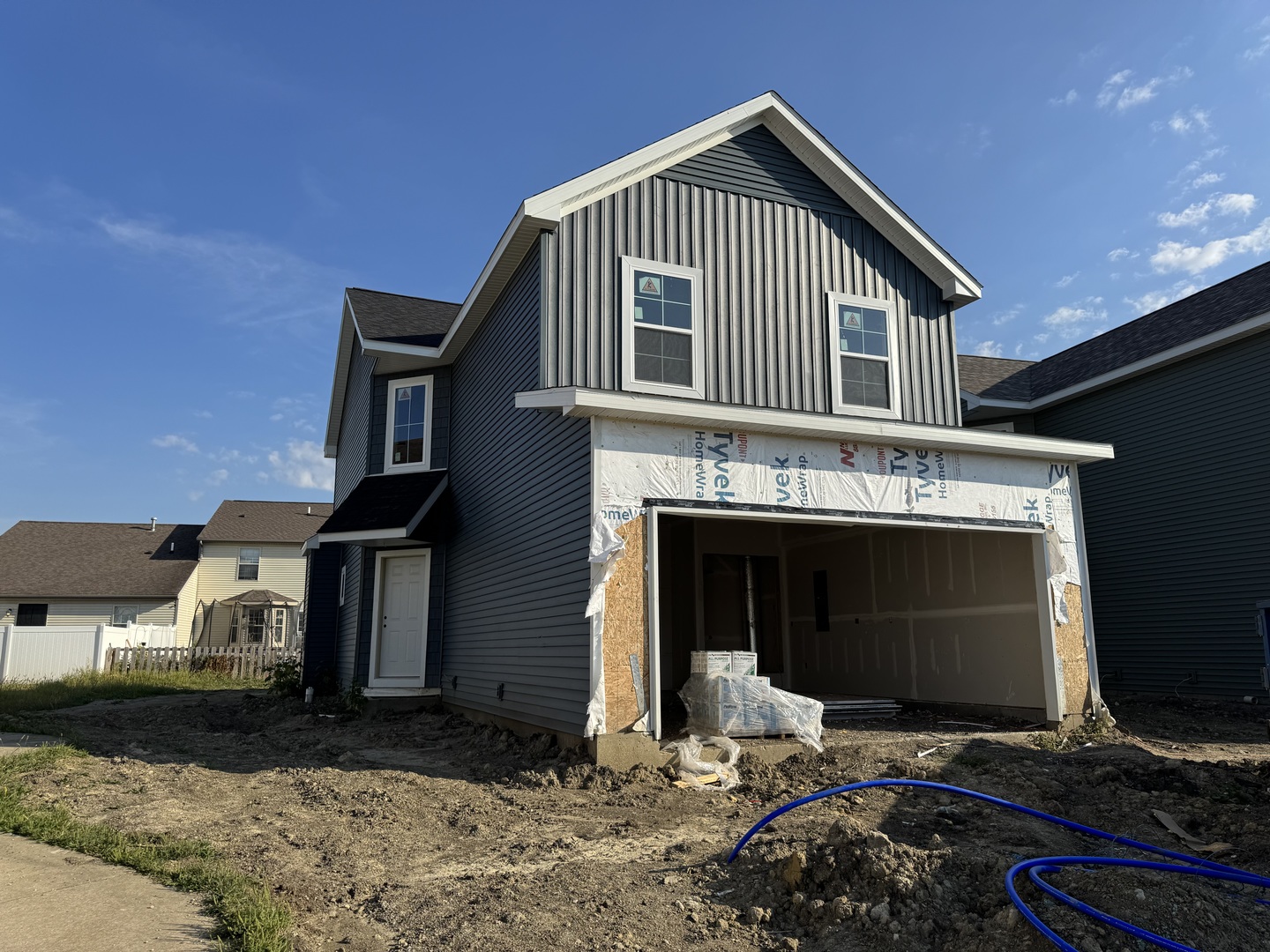 3712 Lighthouse Pointe Champaign, IL 61822 - Photo 8 of 11 a front view of a house with a yard