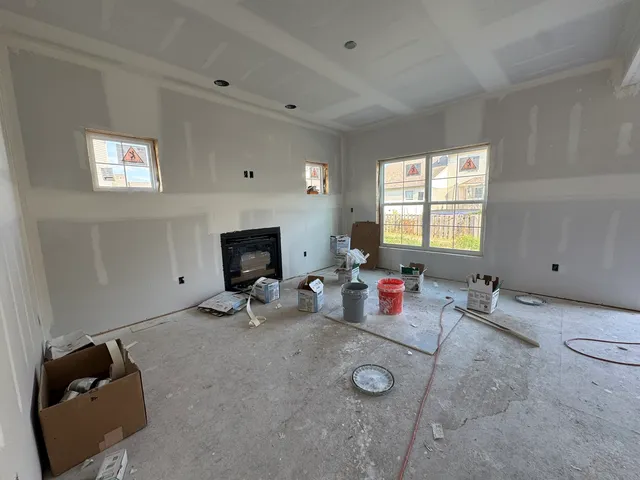 a view of a room with cabinet and mirrors