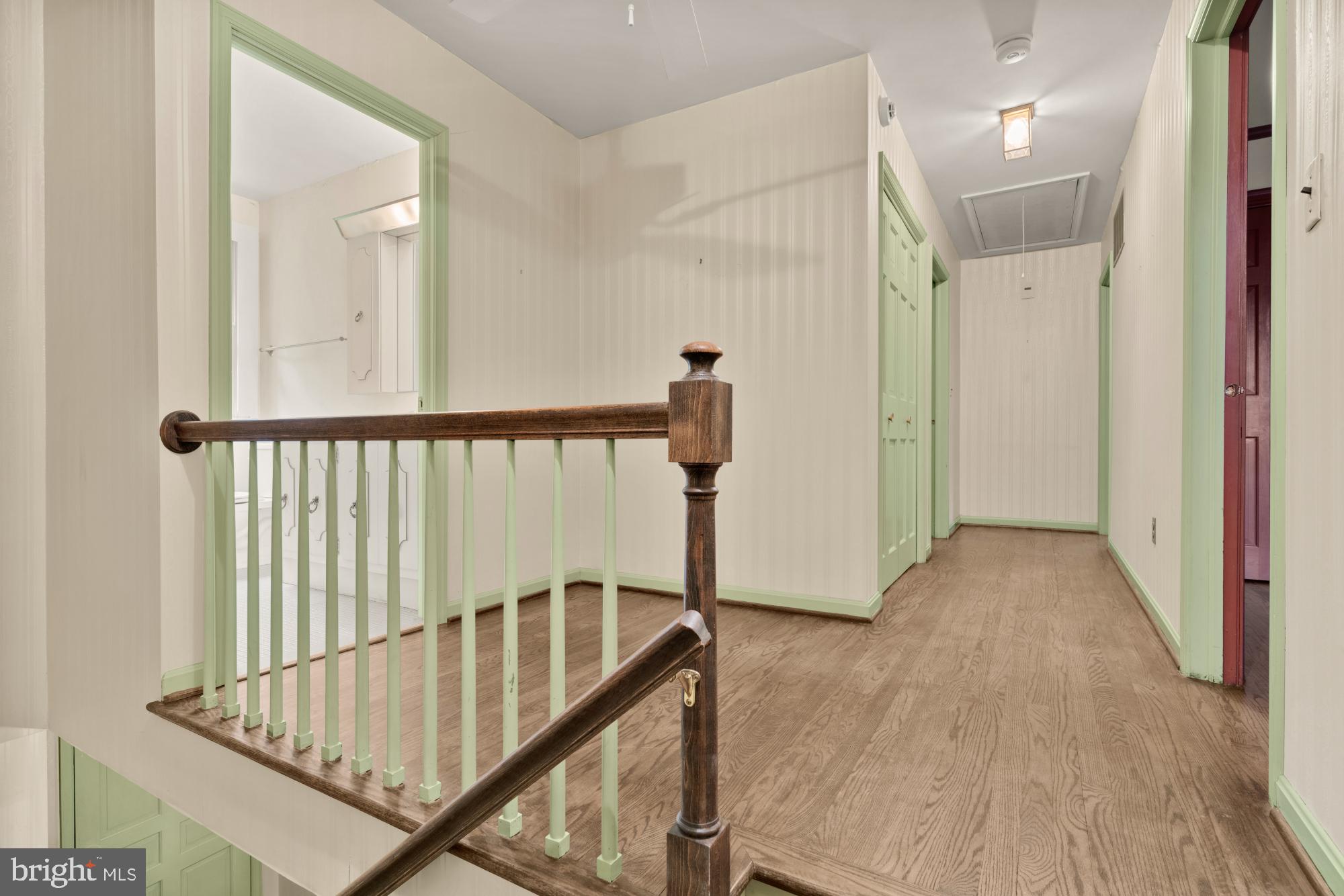13001 Dulaney Valley Road Glen Arm, MD 21057 - Photo 24 of 52 a view of a hallway with wooden floor and staircase