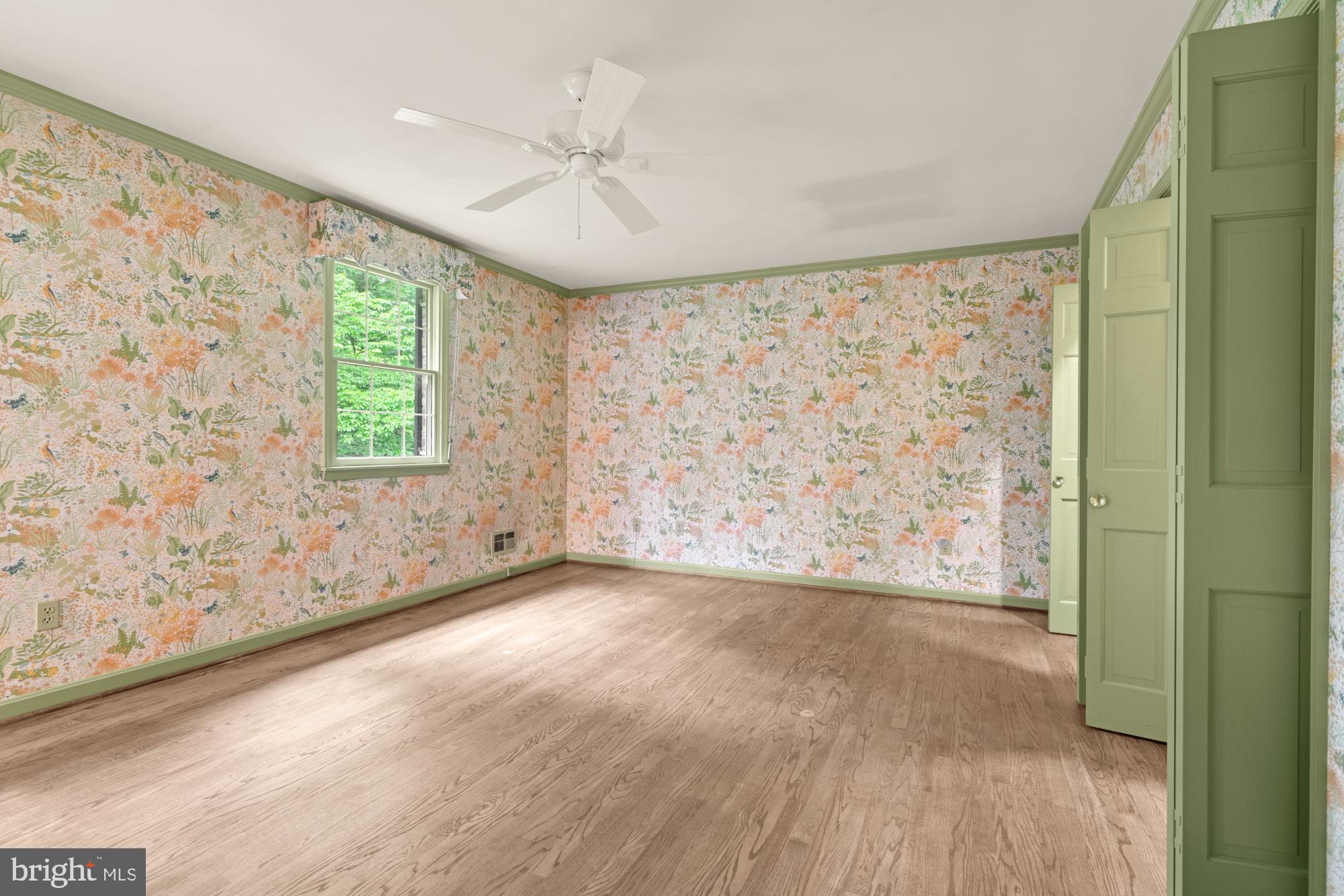 13001 Dulaney Valley Road Glen Arm, MD 21057 - Photo 26 of 52 wooden floor in an empty room with a window