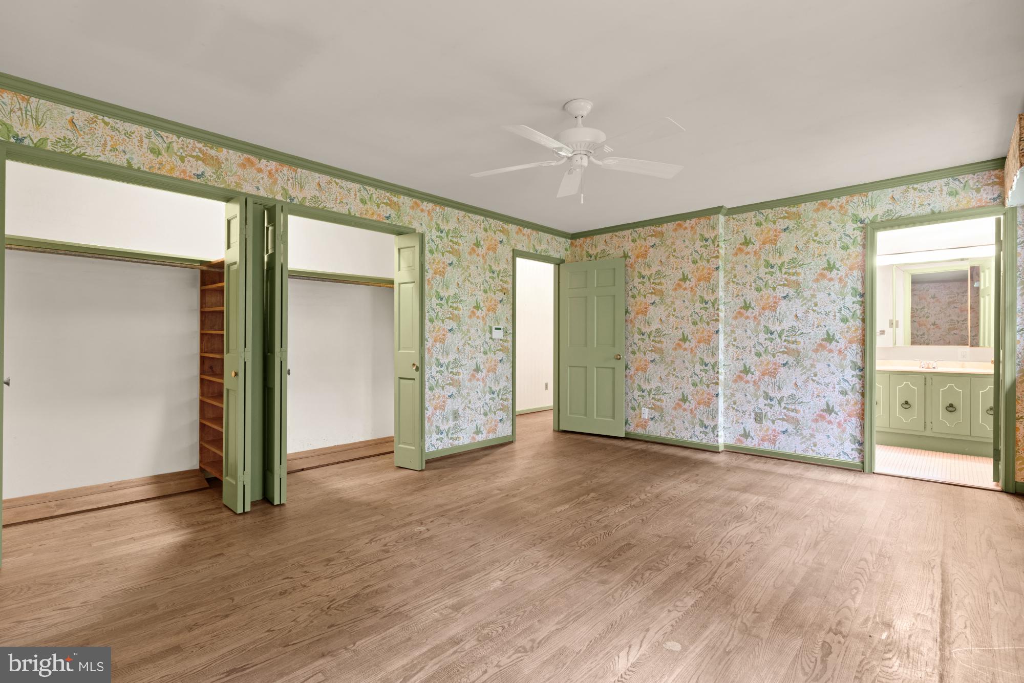 13001 Dulaney Valley Road Glen Arm, MD 21057 - Photo 27 of 52 an empty room with closet and windows