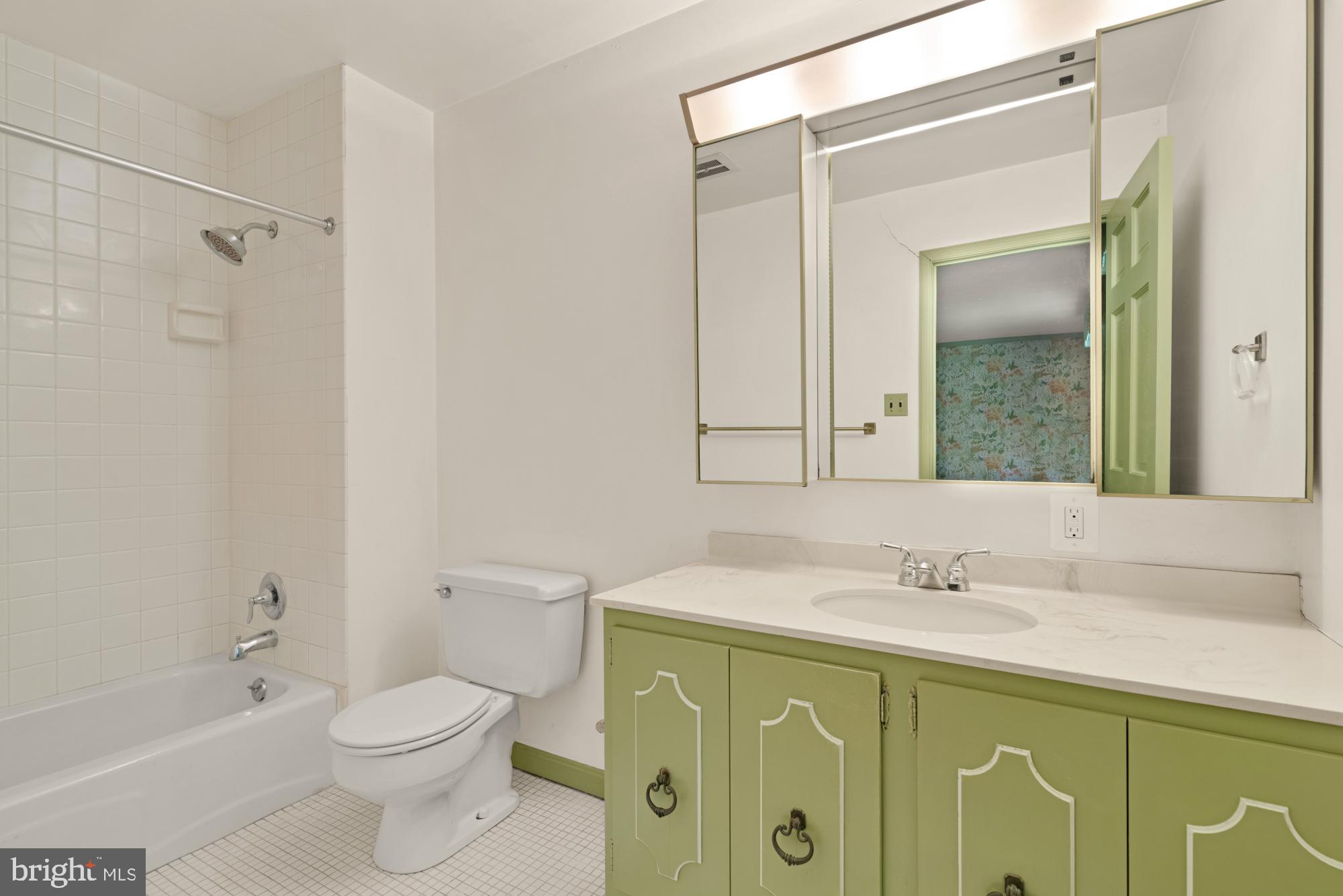 13001 Dulaney Valley Road Glen Arm, MD 21057 - Photo 28 of 52 a bathroom with a sink toilet and shower