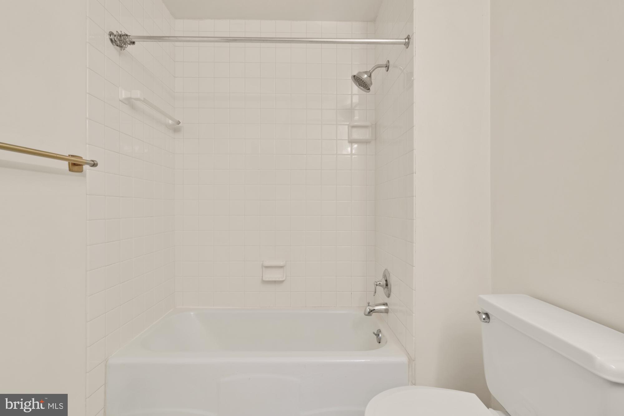 13001 Dulaney Valley Road Glen Arm, MD 21057 - Photo 30 of 52 a bathroom with a shower and a toilet