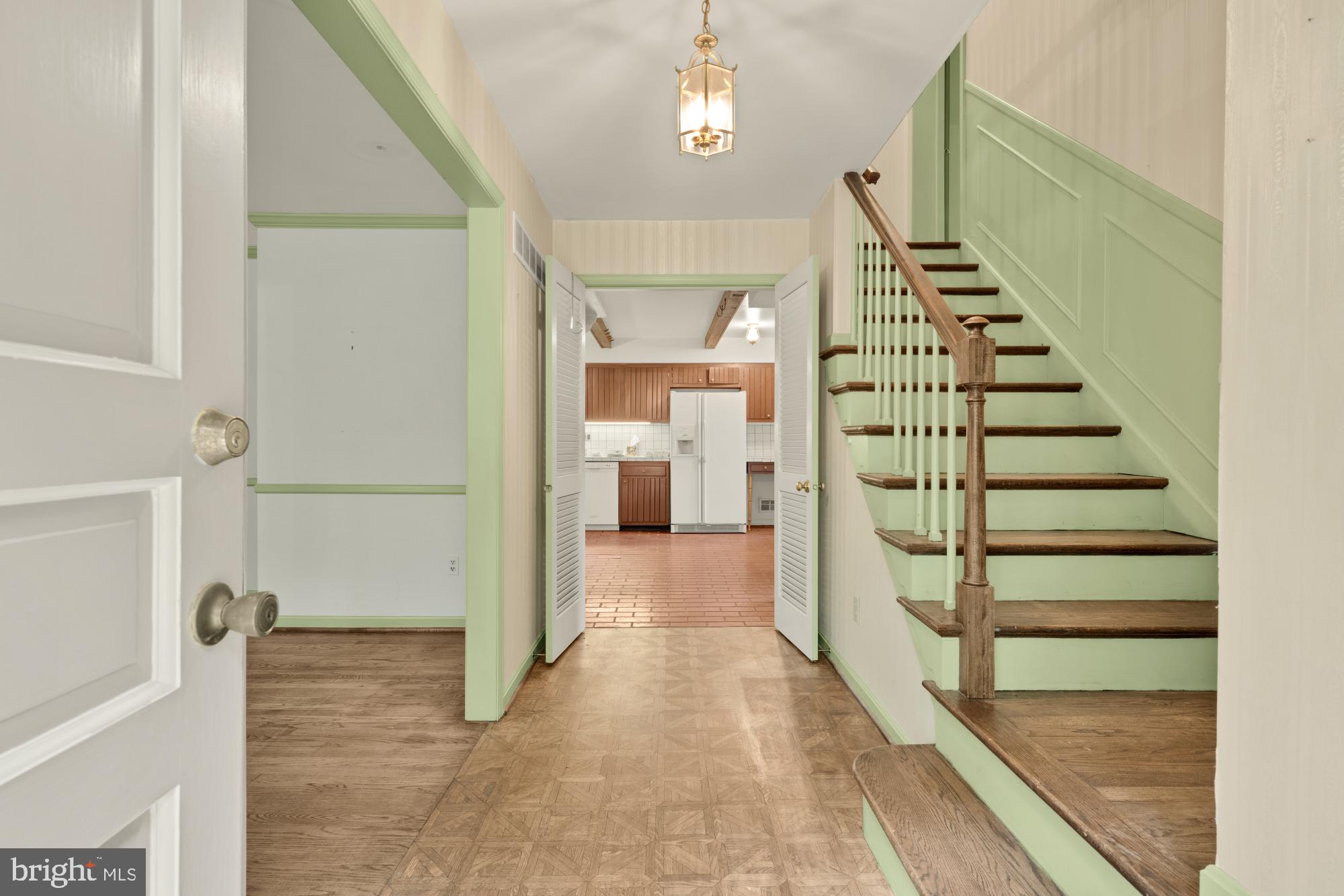 13001 Dulaney Valley Road Glen Arm, MD 21057 - Photo 6 of 52 a view of a hallway with wooden floor and entryway