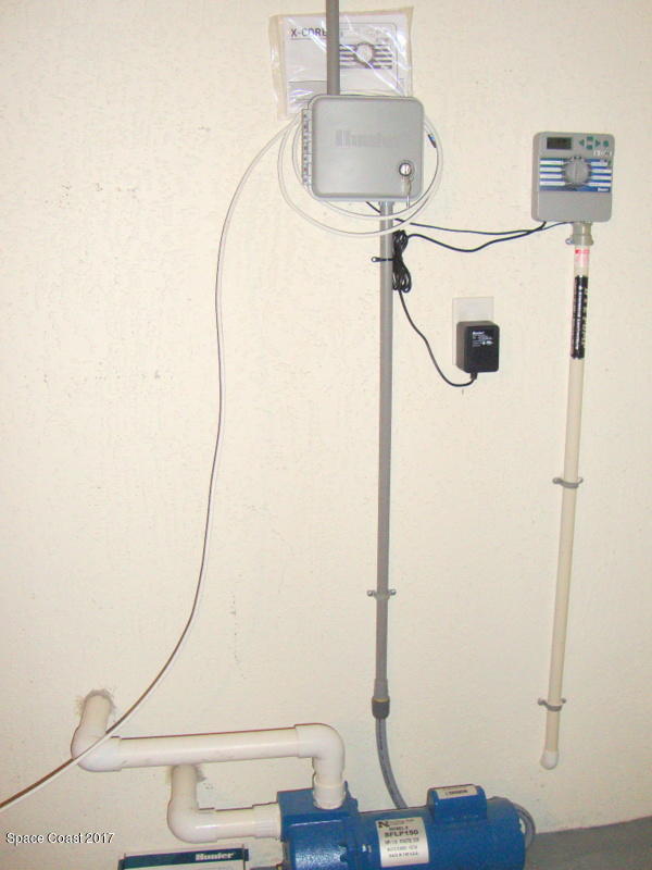 1441 Bridgeport Circle Rockledge, FL 32955 - Photo 22 of 26 a room with staircase and wooden floor