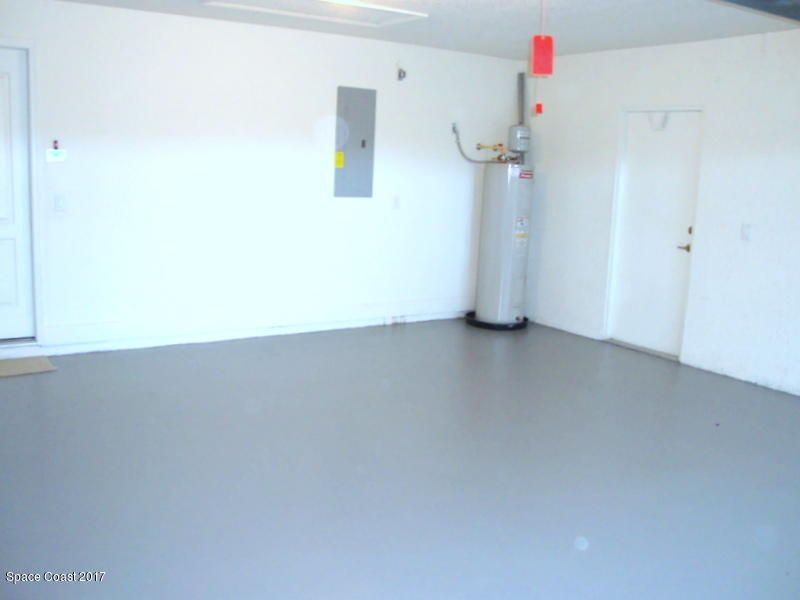 1441 Bridgeport Circle Rockledge, FL 32955 - Photo 23 of 26 a view of a room with an empty space