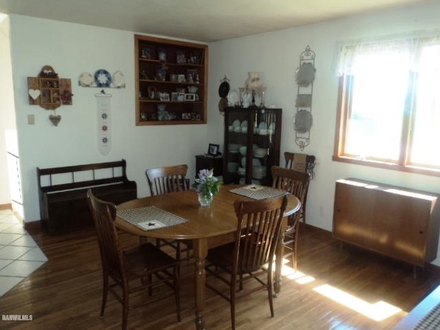 2714 West Buckeye Road Freeport, IL 61032 - Photo 5 of 19 a view of a dining room with furniture and window