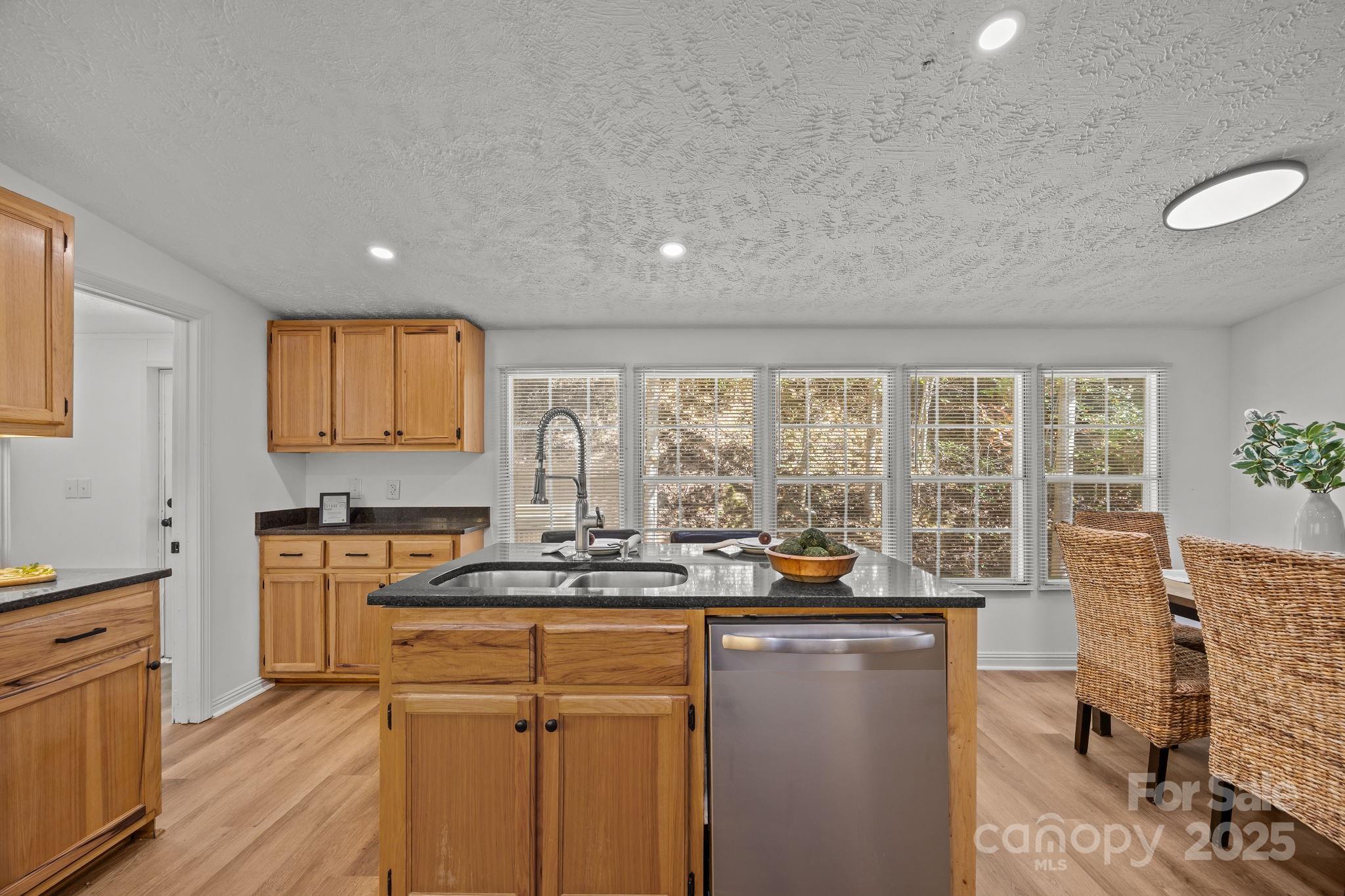 86 Tuts Terrace Sylva, NC 28779 - Photo 18 of 48 a kitchen with sink a stove and cabinets