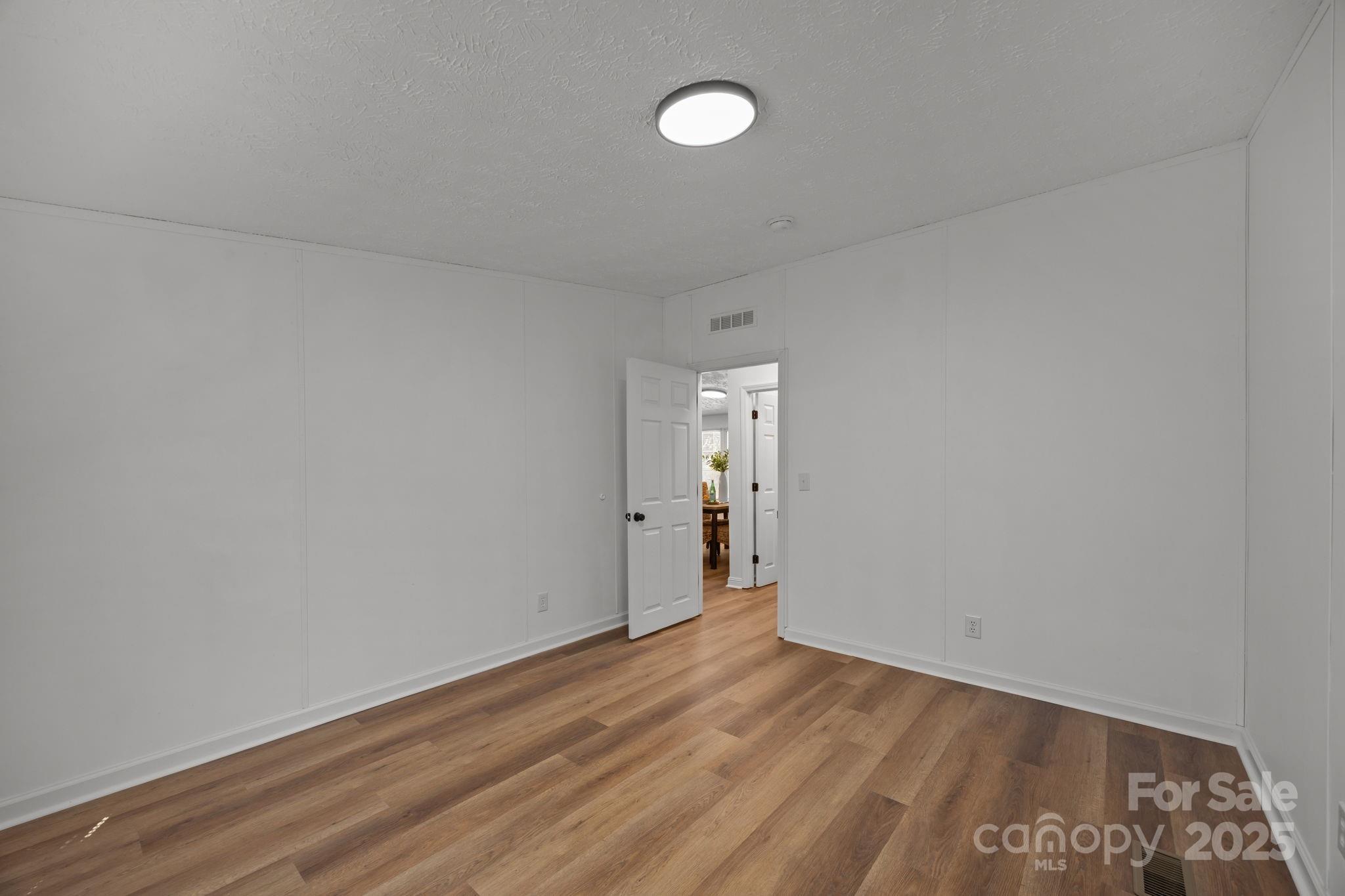 86 Tuts Terrace Sylva, NC 28779 - Photo 23 of 48 a view of a room with wooden floor