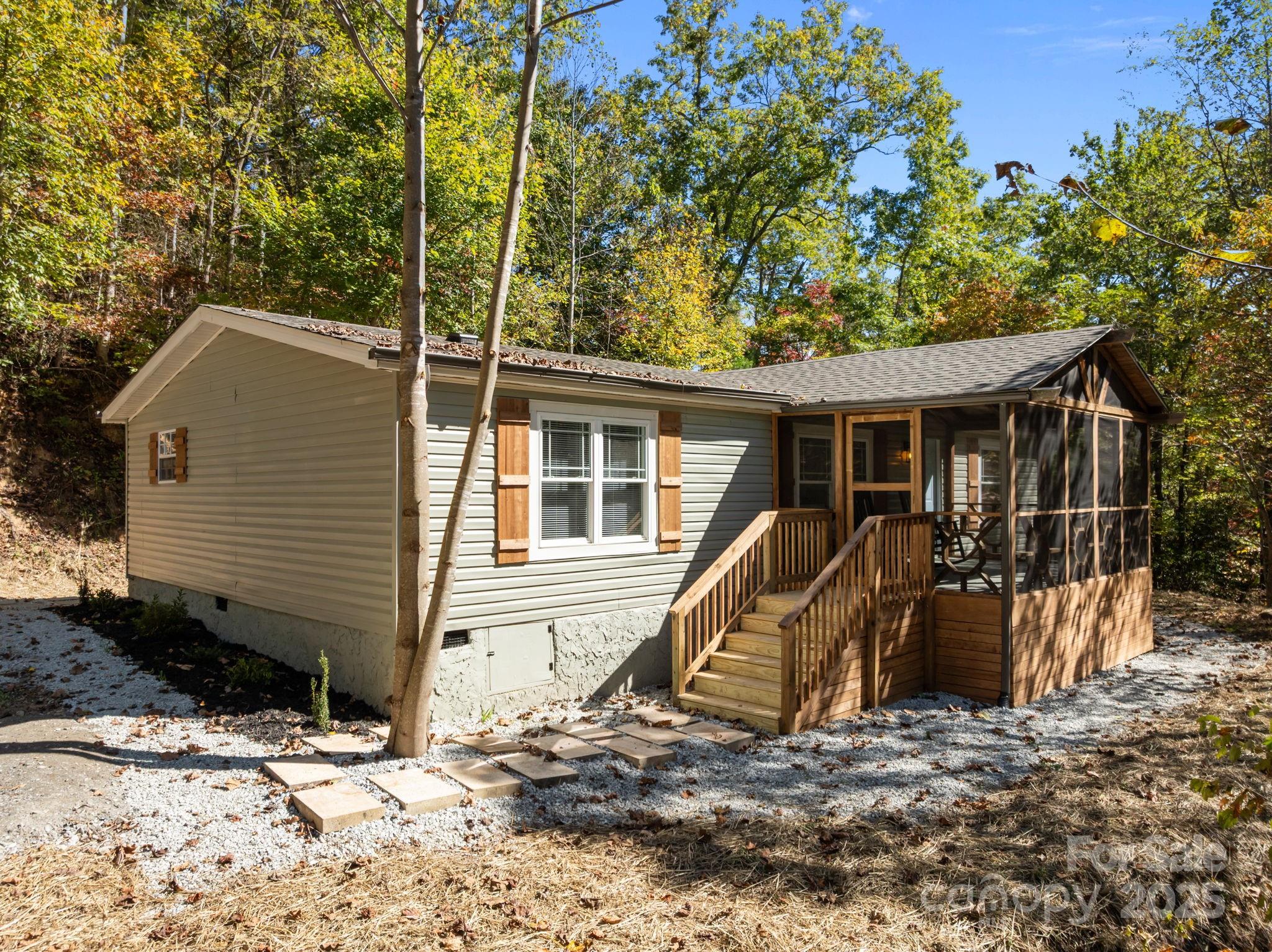86 Tuts Terrace Sylva, NC 28779 - Photo 28 of 48 a view of a house with backyard