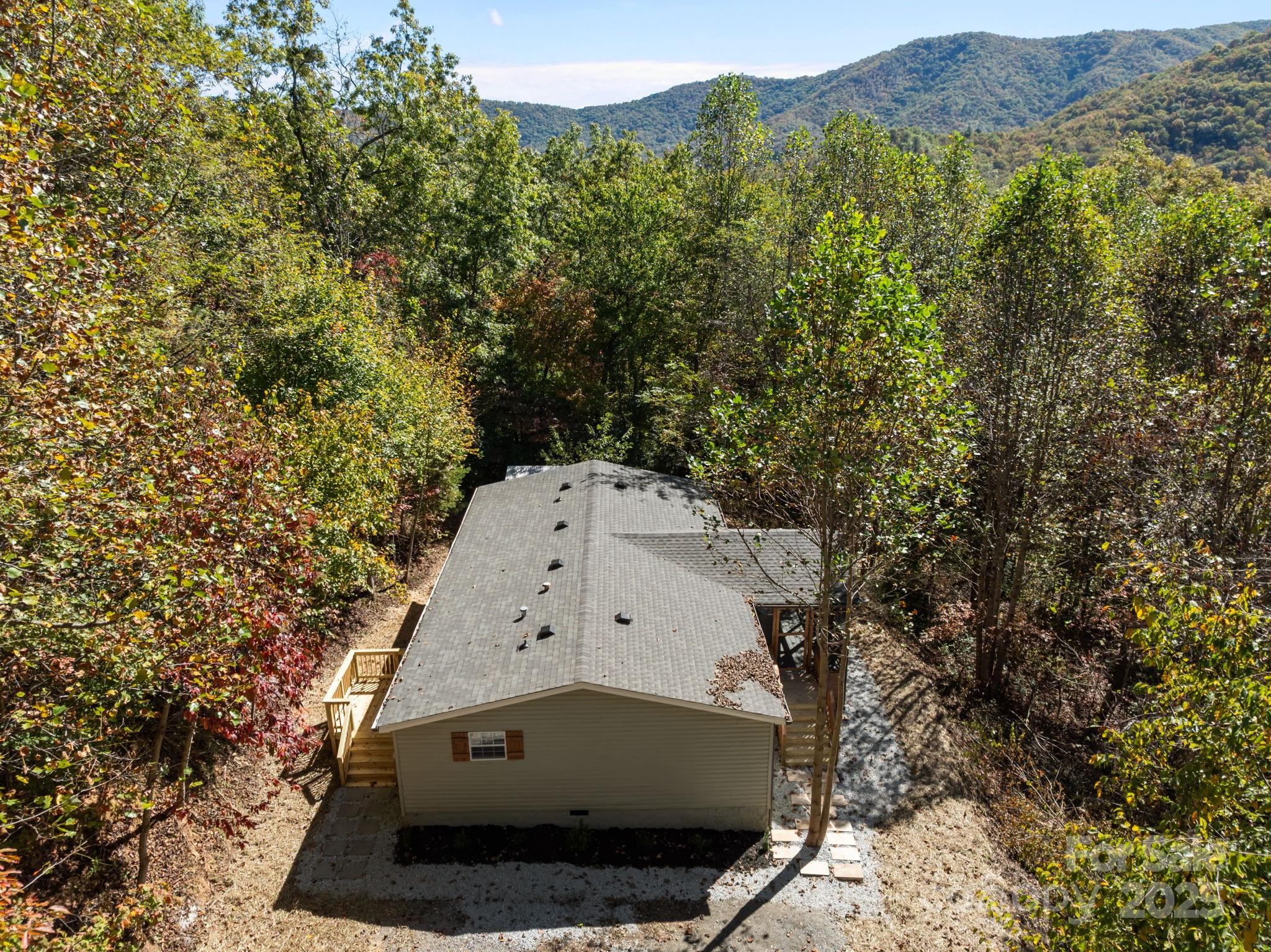86 Tuts Terrace Sylva, NC 28779 - Photo 35 of 48 an aerial view of a house with a yard