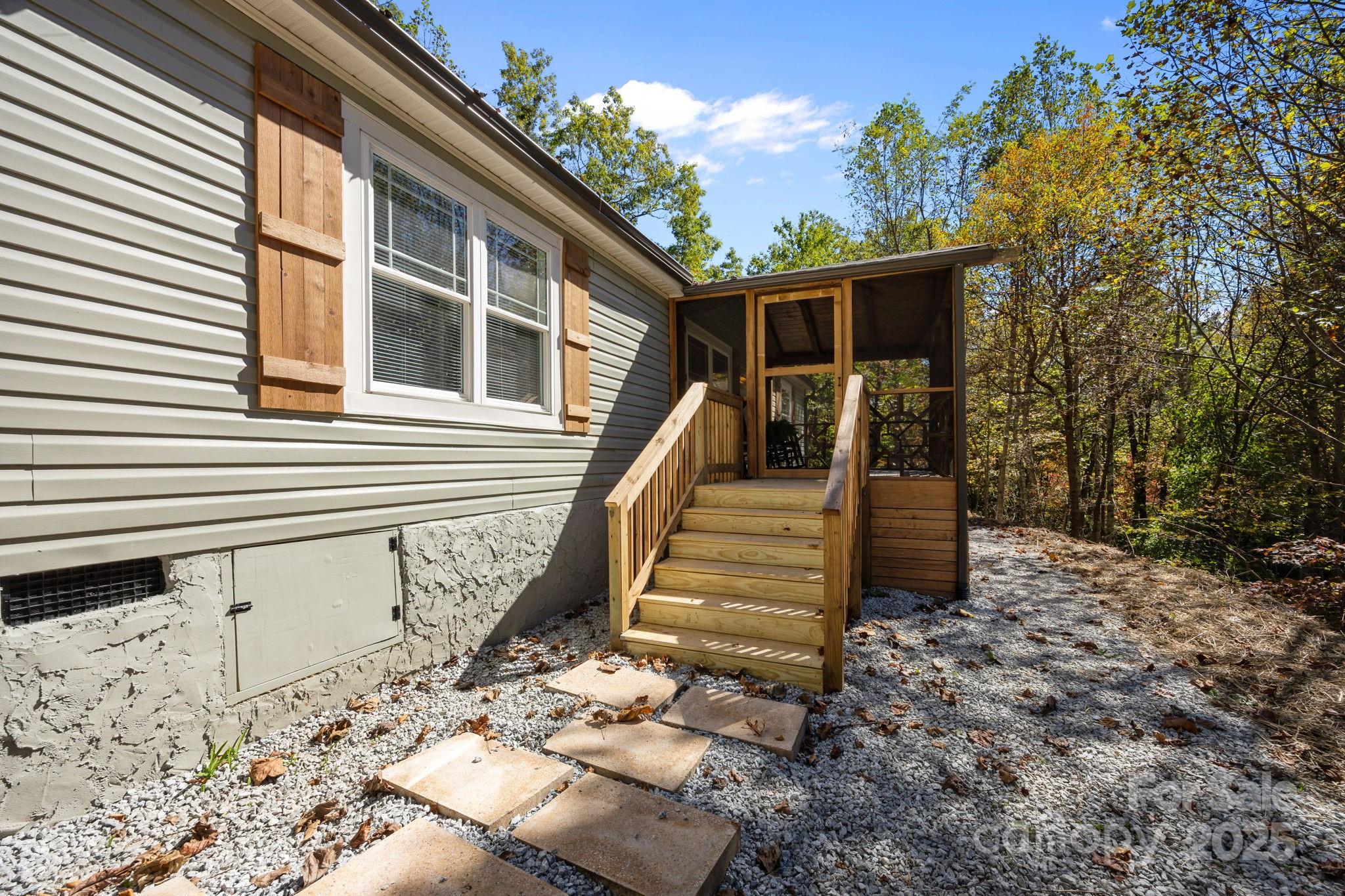 86 Tuts Terrace Sylva, NC 28779 - Photo 39 of 48 a view of a house with backyard and wooden fence