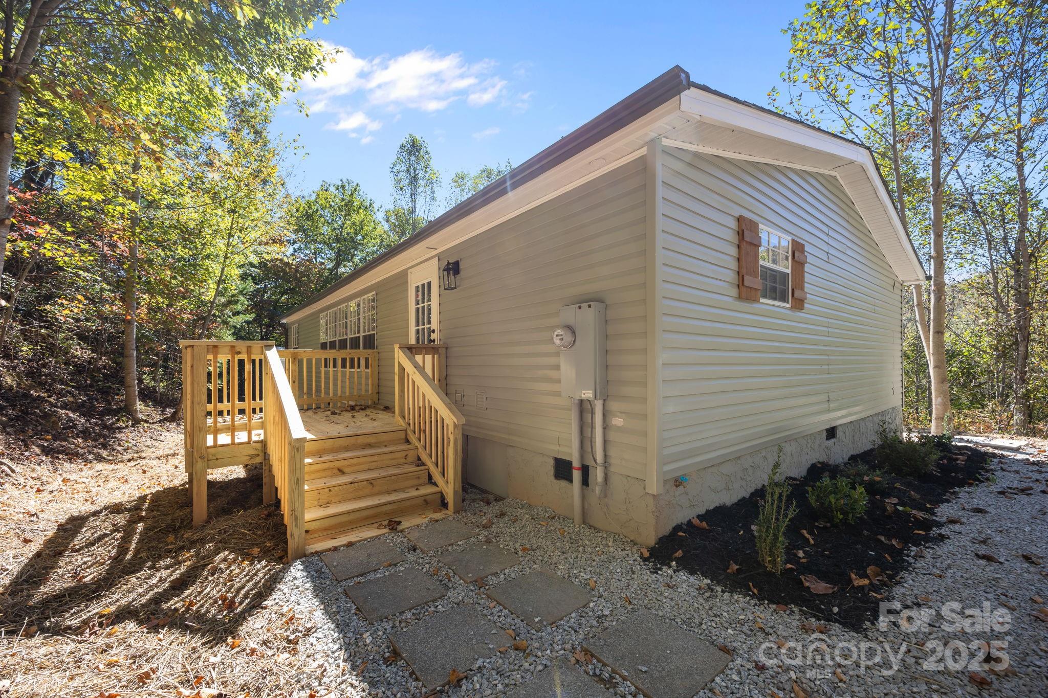 86 Tuts Terrace Sylva, NC 28779 - Photo 40 of 48 a view of a house with backyard and trees