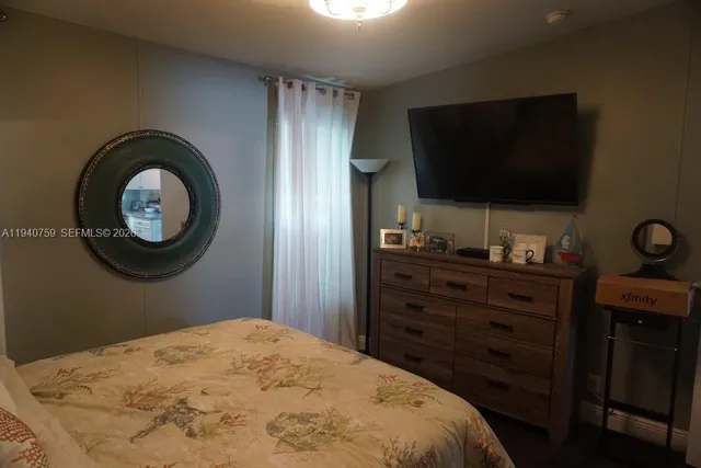 a view of a living room and dining room