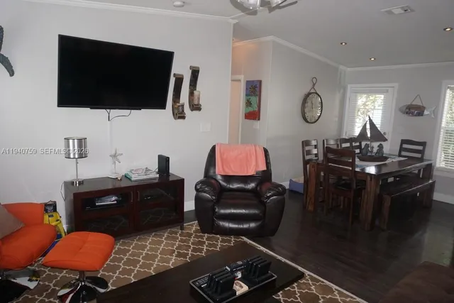 a living room with furniture and decor