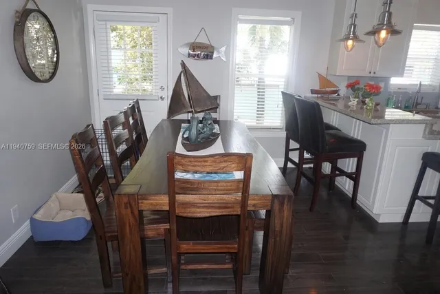 a living room with furniture fireplace and flat screen tv