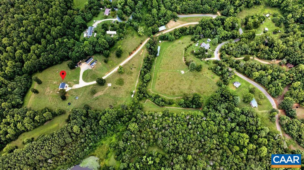 965 Horseshoe Road Arrington, VA 22922 - Photo 4 of 69 The property features three fenced pastures and three natural creeks, making it ideal for horses, livestock, or simply enjoying the beauty of the countryside.