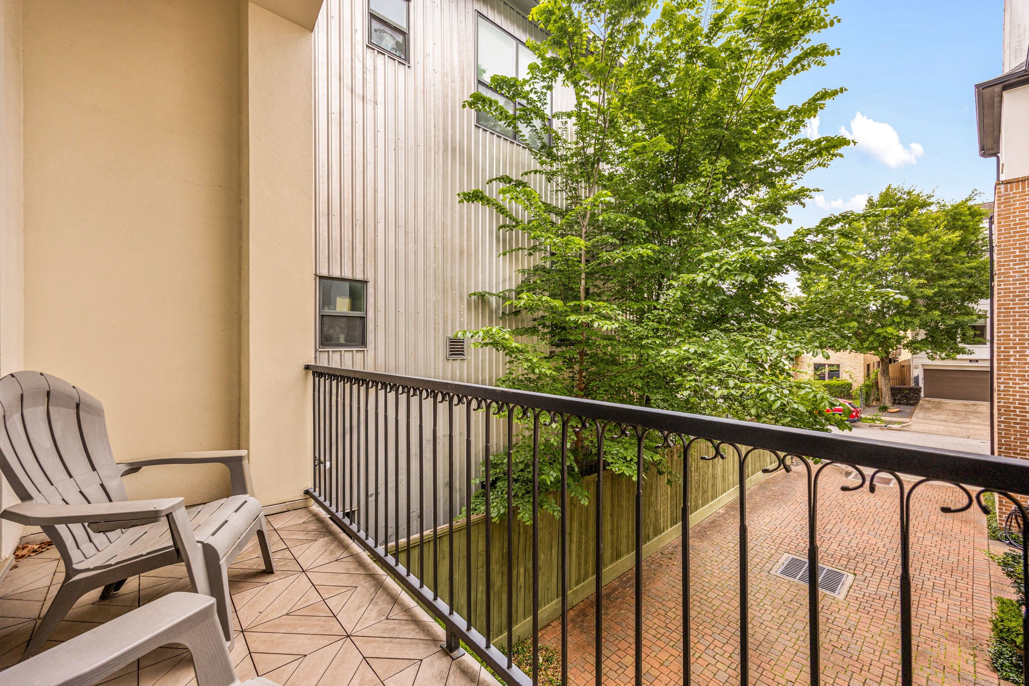 310 West Bell Street Houston, TX 77019 - Photo 18 of 44 The charming balcony provides a peaceful spot to relax outdoors.
