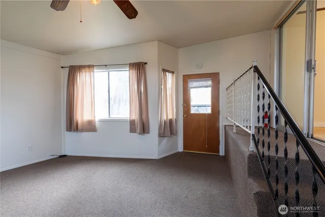 an empty room with windows