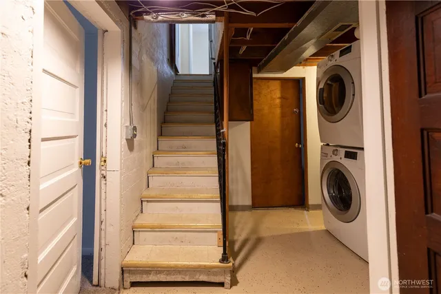 a utility room with dryer and washer