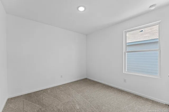 an empty room with a window