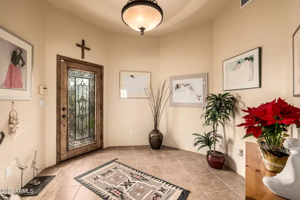 a kitchen with stainless steel appliances granite countertop a sink a stove and cabinets