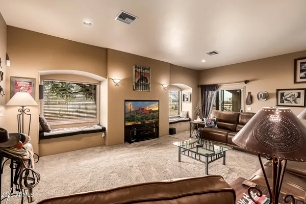 a bathroom with a sink toilet and a mirror