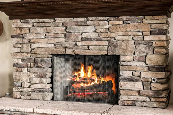 a bathroom with a tub and a window