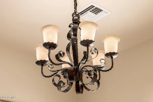 a bedroom with bed and a window