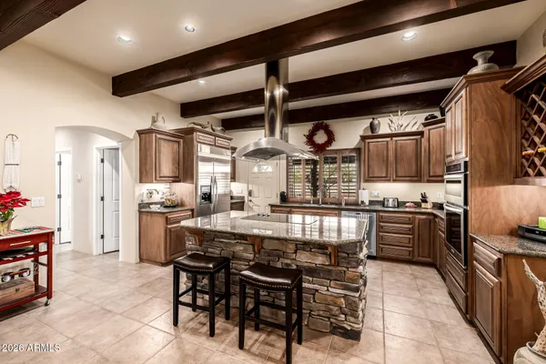 a bedroom with a bed and a view of bedroom