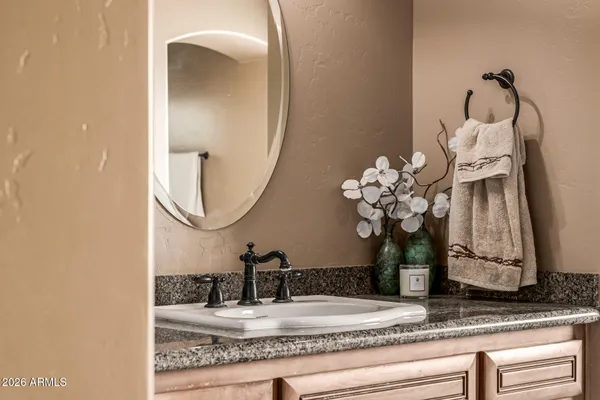a view of a patio with table and chairs potted plants with wooden floor