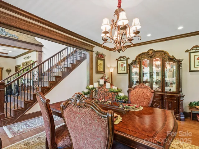 a kitchen with stainless steel appliances granite countertop a stove a sink and a cabinets