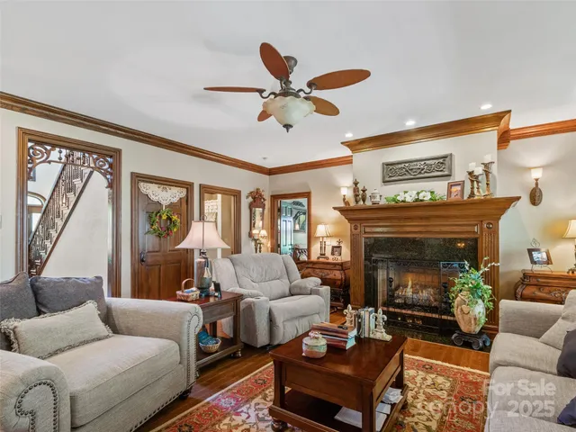 a spacious bathroom with a toilet sink double vanity and mirror