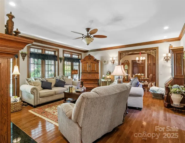 a view of a patio with table and chairs and potted plants