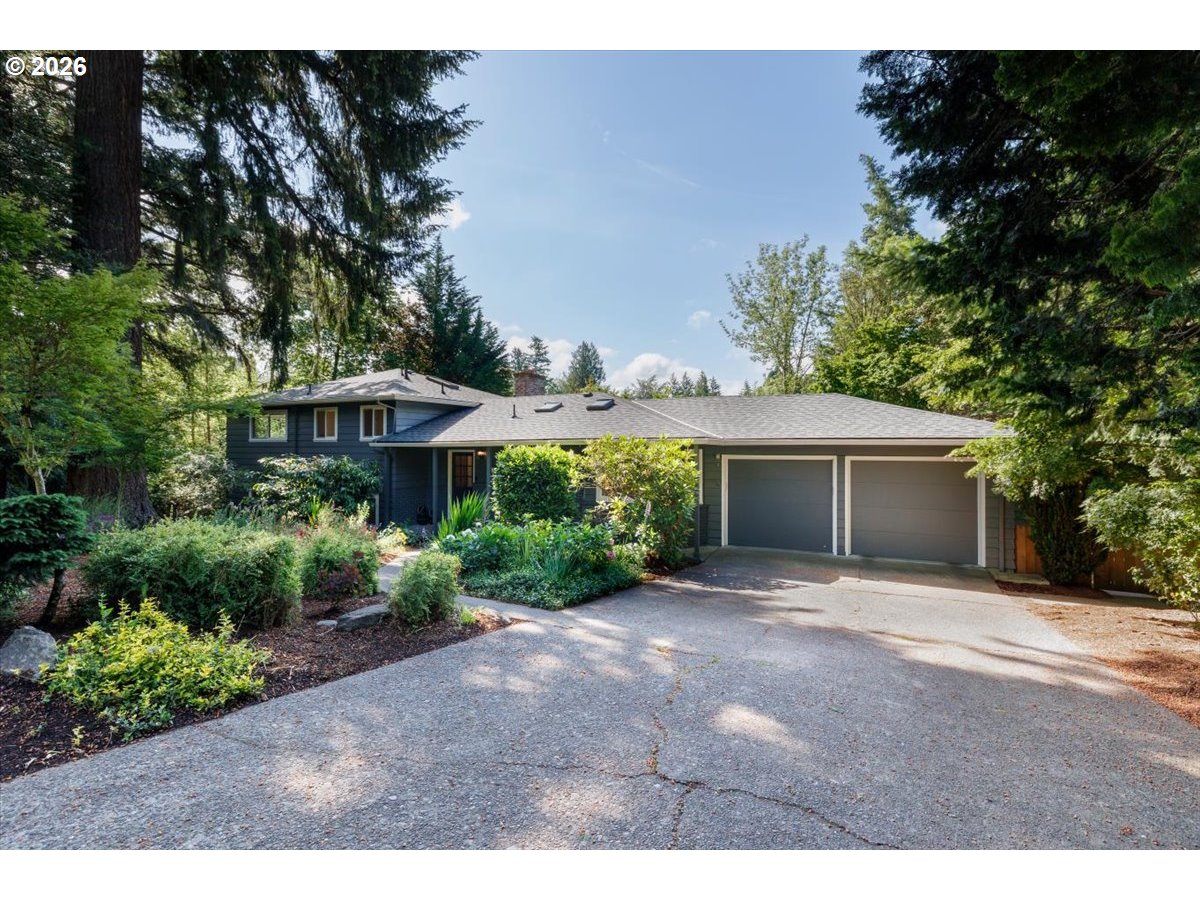 175 Northwest 95th Avenue Portland, OR 97229 - Photo 1 of 46 a front view of a house with a yard