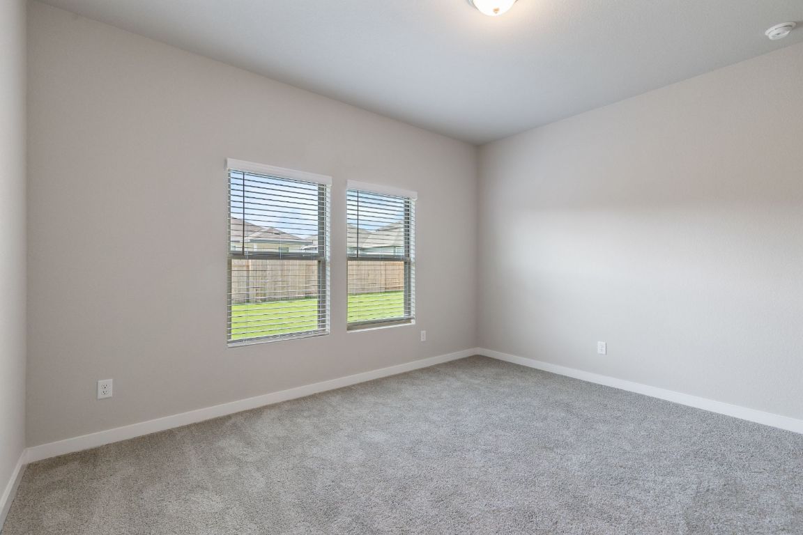 13617 Gray Landing Drive Elgin, TX 78621 - Photo 15 of 29 an empty room with a window