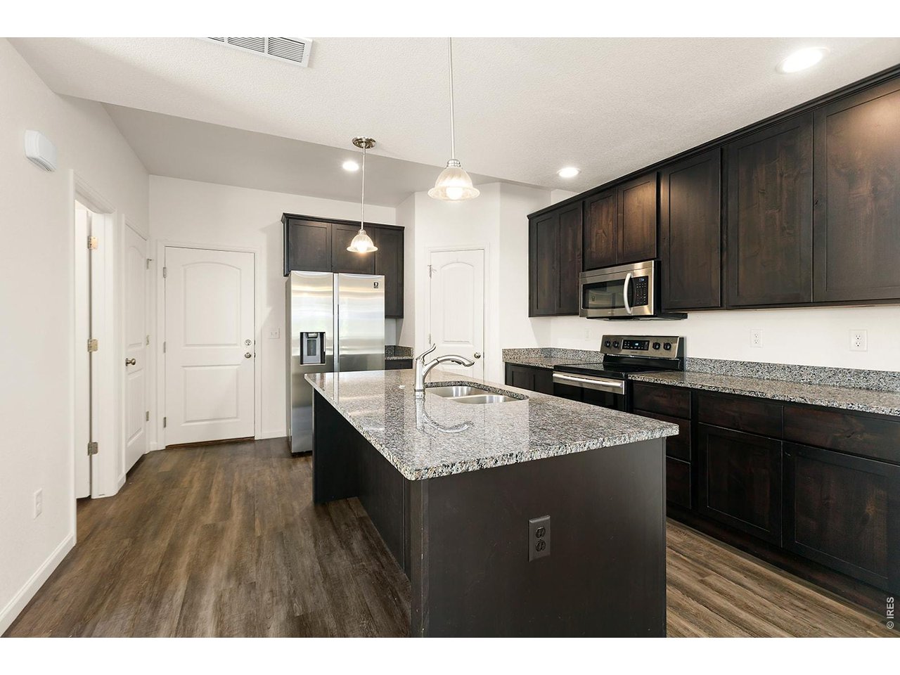 4355 24th Street Road, Unit 1401 Greeley, CO 80634 - Photo 7 of 23 Spacious Kitchen with Large Island