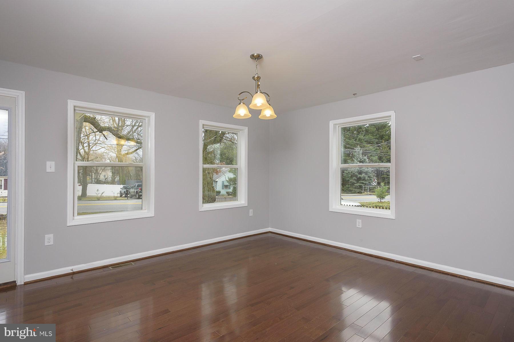 8658 Oakleigh Road Baltimore, MD 21234 - Photo 3 of 30 Large Dining Room with Hardwood Flooring