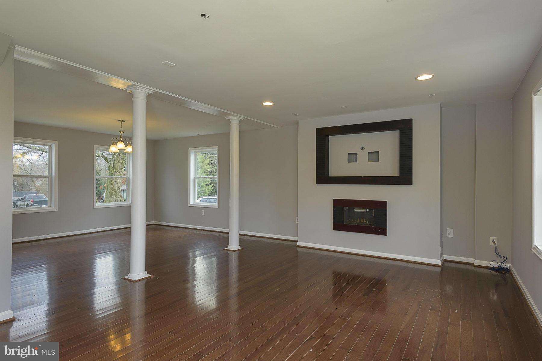 8658 Oakleigh Road Baltimore, MD 21234 - Photo 6 of 30 Living Room with Electric Fireplace