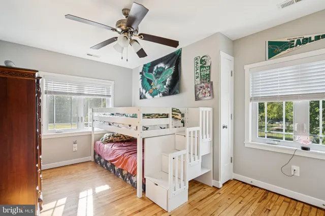 a bed room with a bed and a window