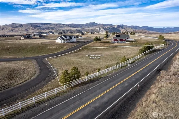 a view of a swimming pool with a lake