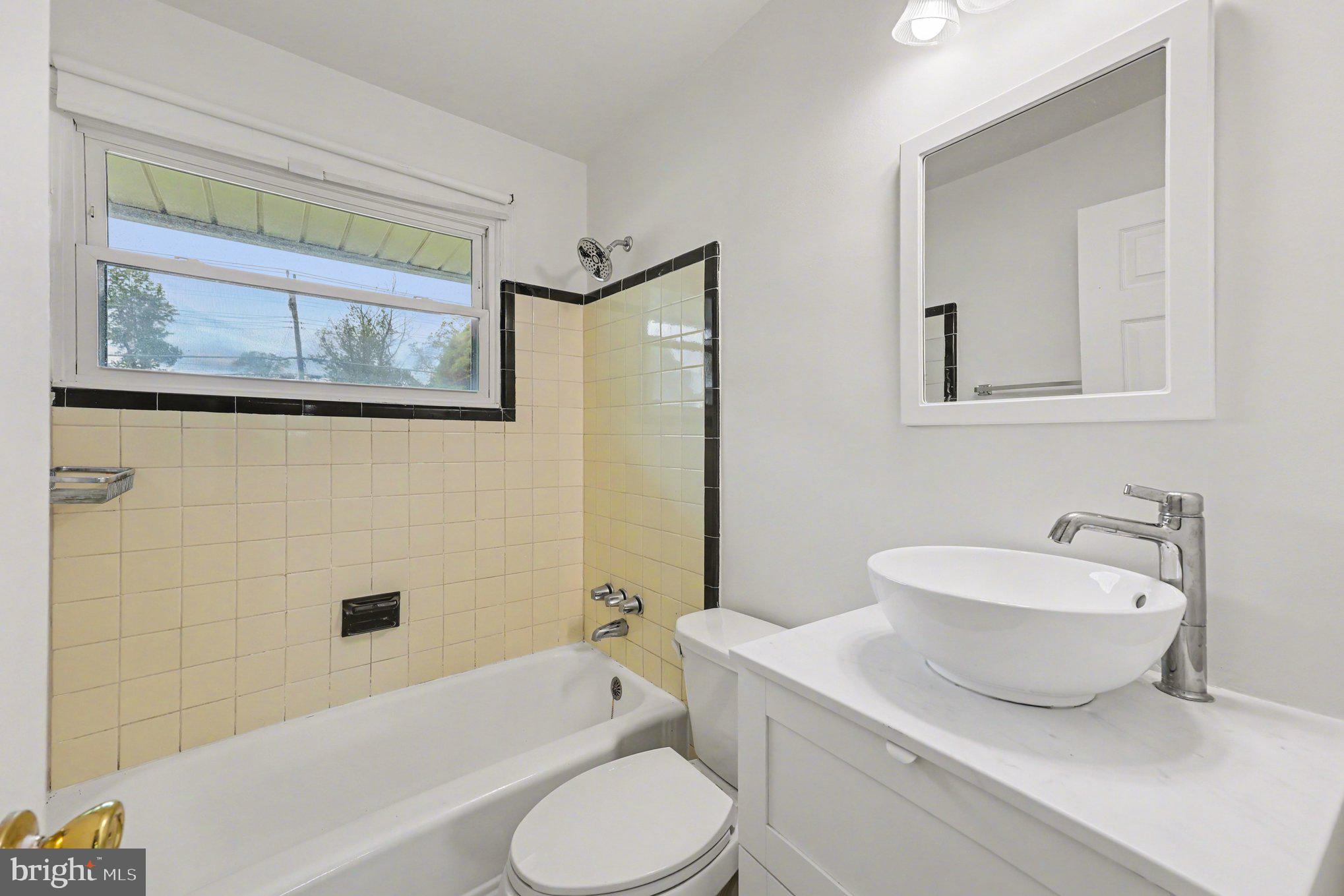 6714 Edsall Road Springfield, VA 22151 - Photo 12 of 16 Charming bathroom with modern touches.