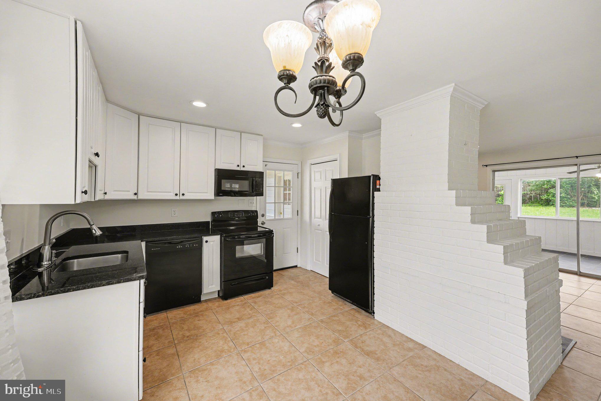 6714 Edsall Road Springfield, VA 22151 - Photo 3 of 16 Charming kitchen with modern finishes.