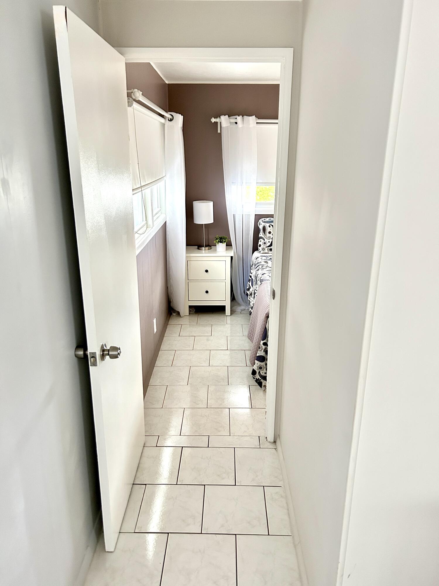 3240 State Street Hollywood, FL 33021 - Photo 23 of 29 a view of bathroom with mirror and a sink